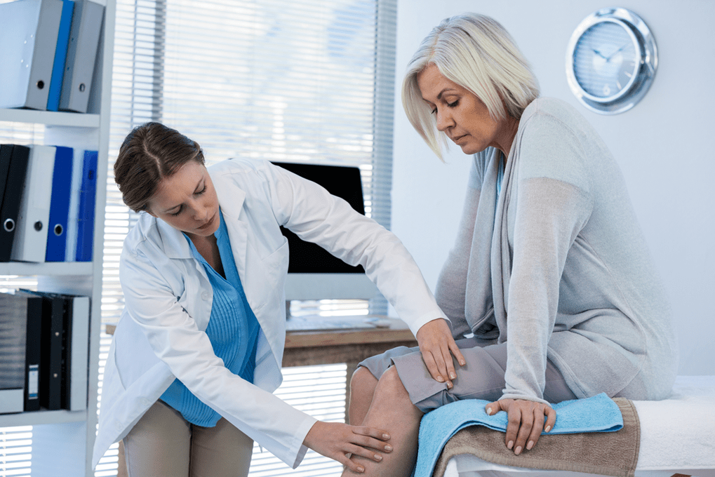 A patient with arthrosis who needs therapy at a doctor's appointment